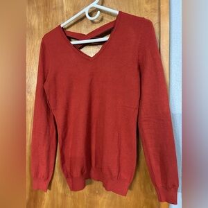 New XS sweater by love Ellie rust colored long sleeve tiny flaws stitch fix